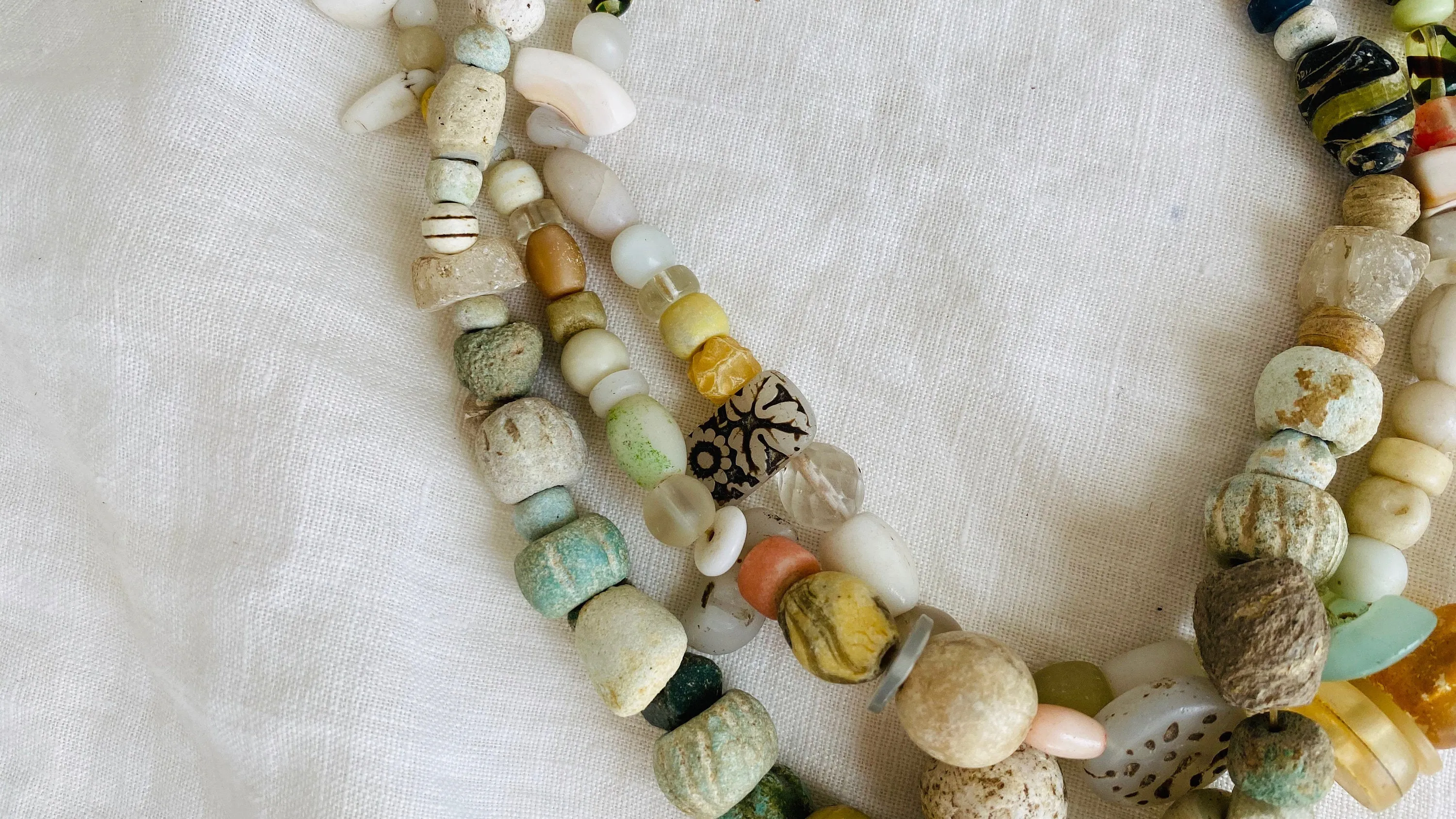 Ancient Stone, Glass and Shell Multi-Strand Necklace.