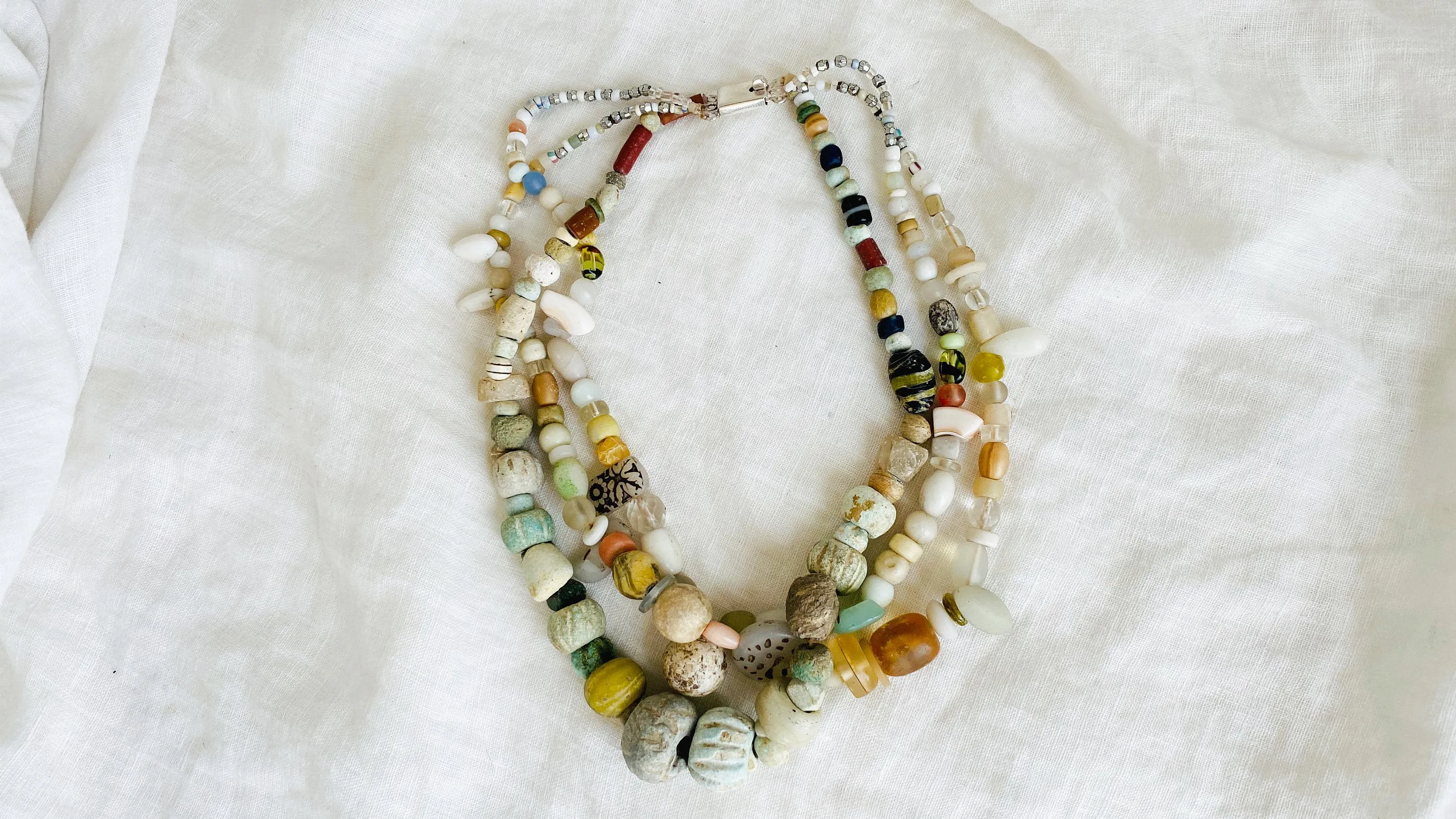 Ancient Stone, Glass and Shell Multi-Strand Necklace.