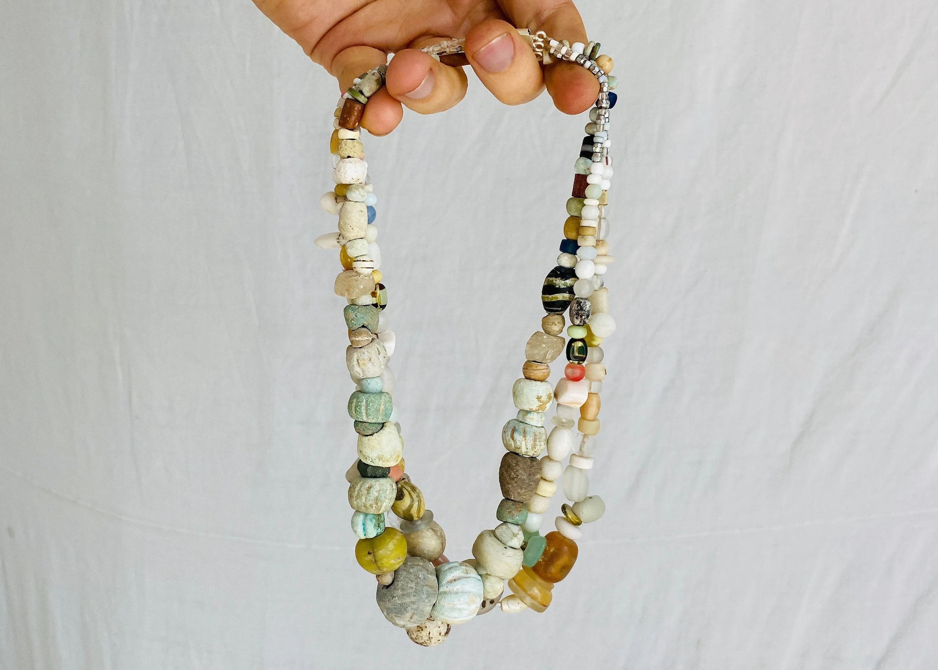 Ancient Stone, Glass and Shell Multi-Strand Necklace.